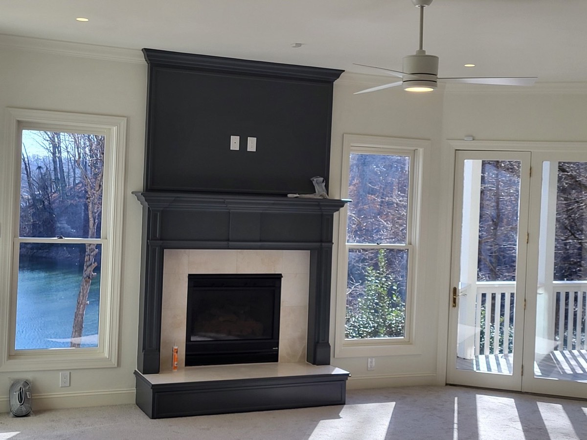 Living room renovation with custom trim and built-in details